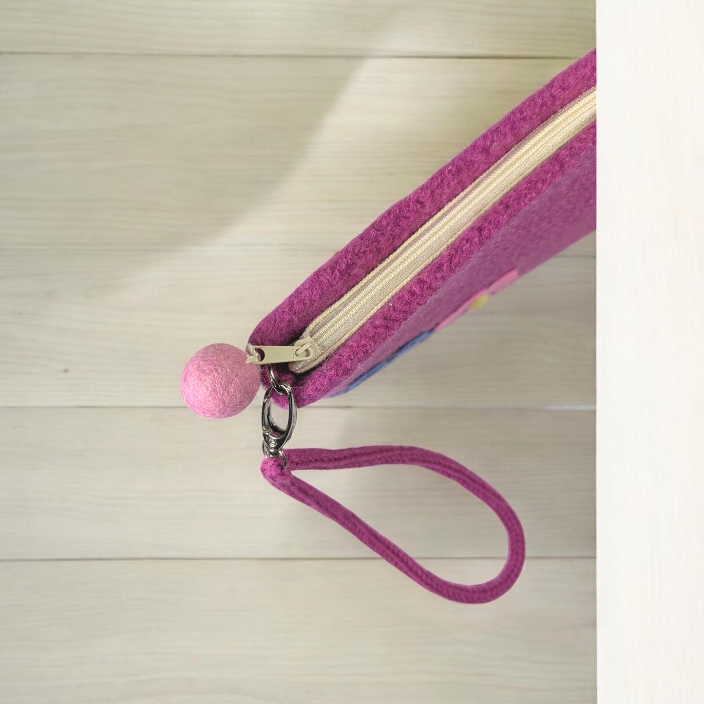 "The Flowered Wristlet" in Pink