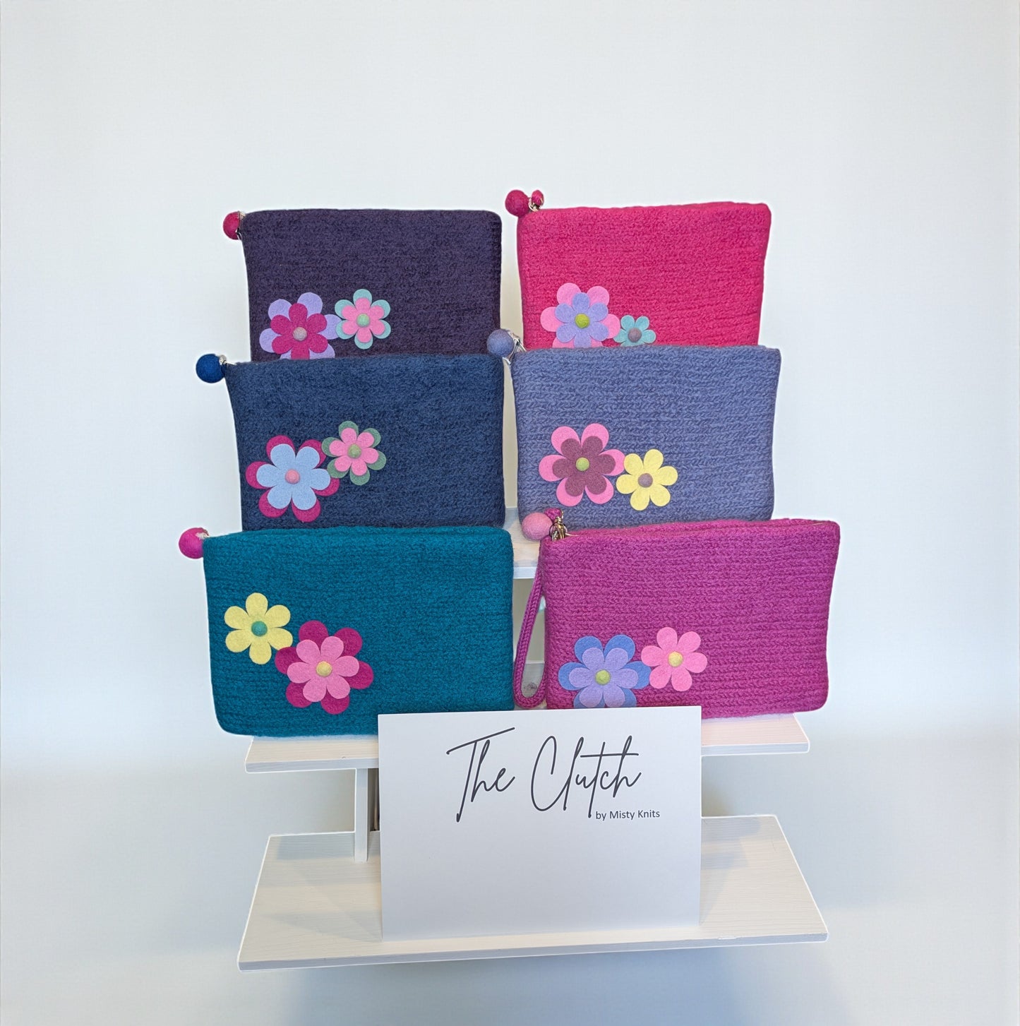 "The Flowered Wristlet" in Pink